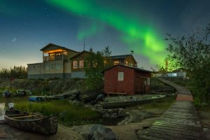 Northern Lights over a house